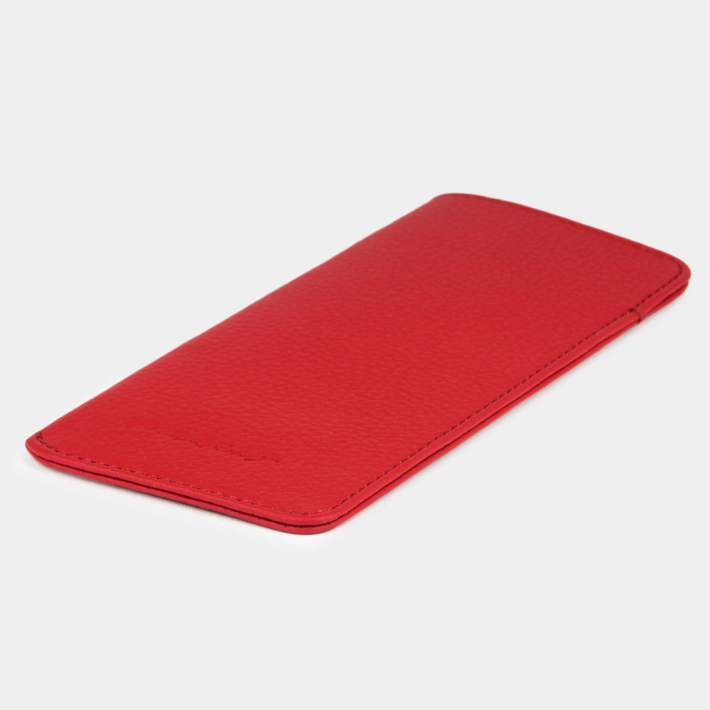 Red calfskin Pocket glasses pouch lying flat, three-quarter view