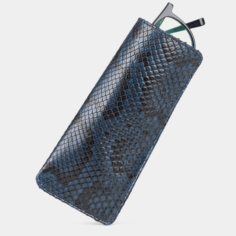 Pocket glasses pouch in blue python with glasses slipping out of the top