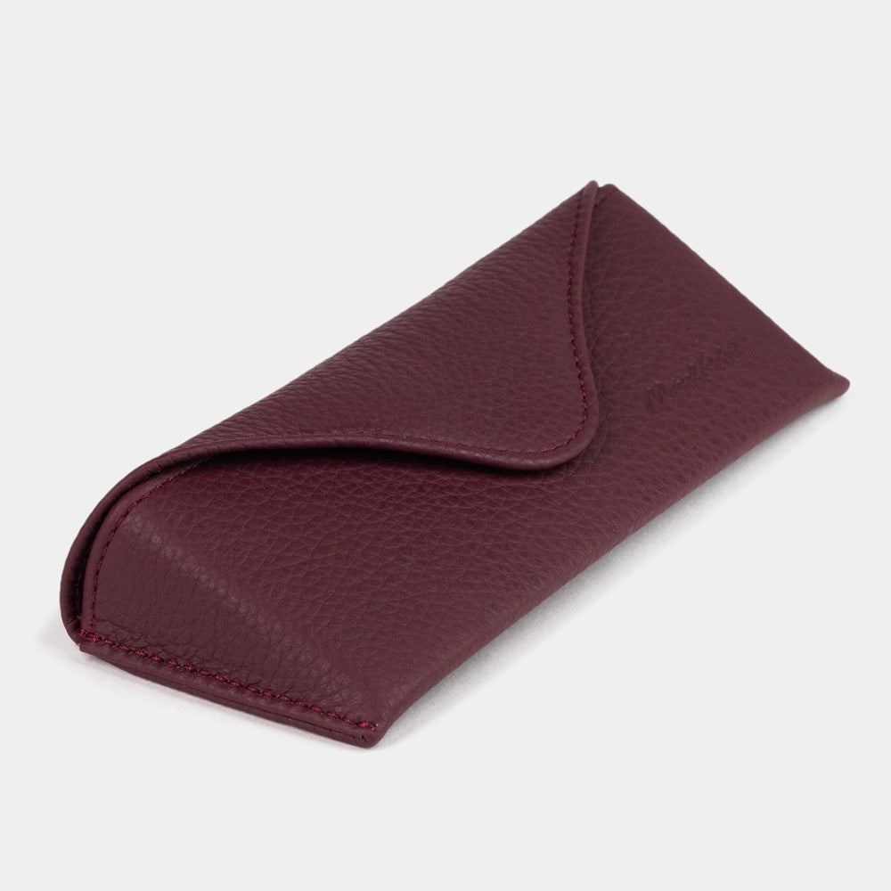 Bordeaux calfskin Casual glasses case at an angle, curved magnetic flap