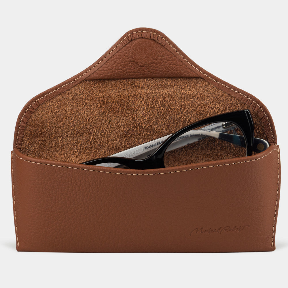 Casual glasses case in gold calfskin, flap open with glasses inside
