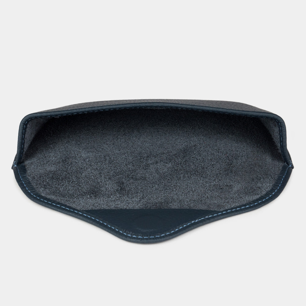 Inside the blue calfskin Riviera sunglasses case: natural suede lining