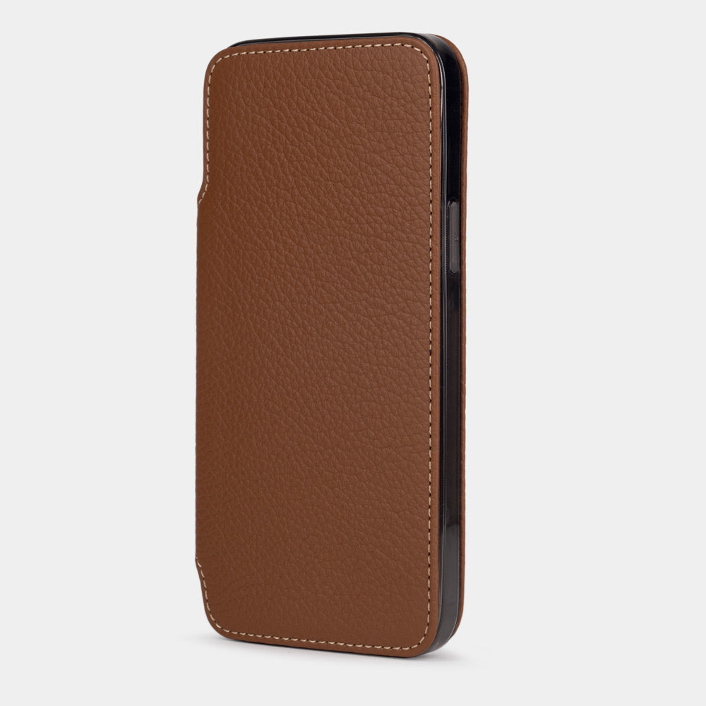 Gold calfskin leather folio case for iPhone 15 Pro – folio closed, three-quarter front view showing the full-grain leather