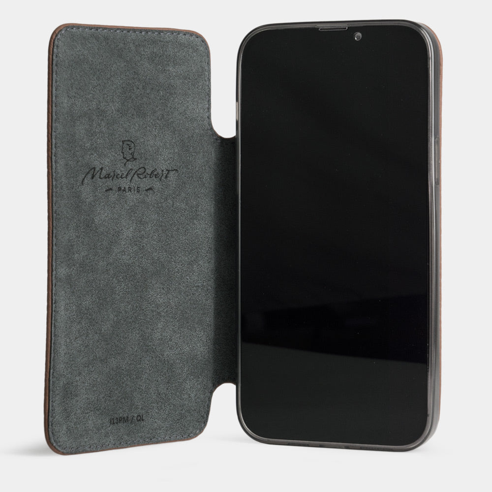Gold calfskin leather folio case for iPhone 15 Pro – folio open, showing the Alcantara® lining and the screen