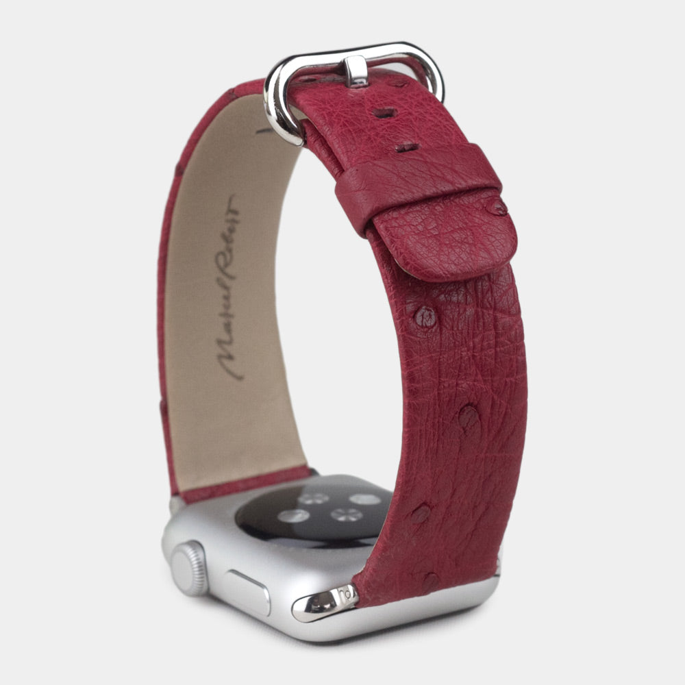 pink ostrich band apple watch steel adapters and buckle upper view