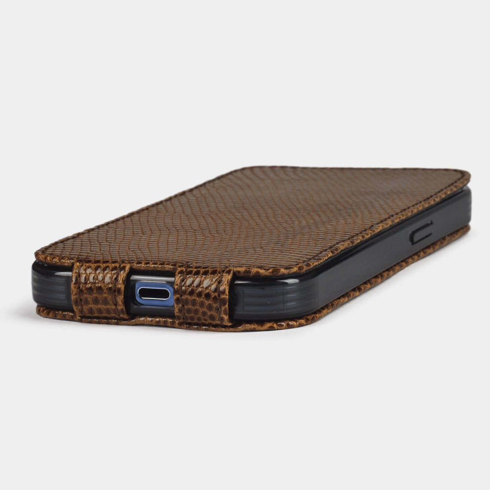 iPhone 14 Pro flip case in brown lizard leather – the case laid flat, showing the precise charging-port cut-out and slim profile