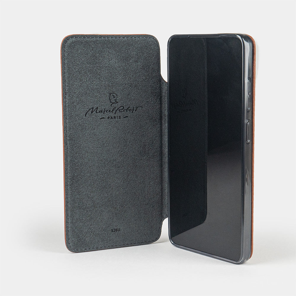 gold calfskin Wallet Case Samsung Galaxy S26 Ultra - case with grey Alcantara lining shown open on smartphone