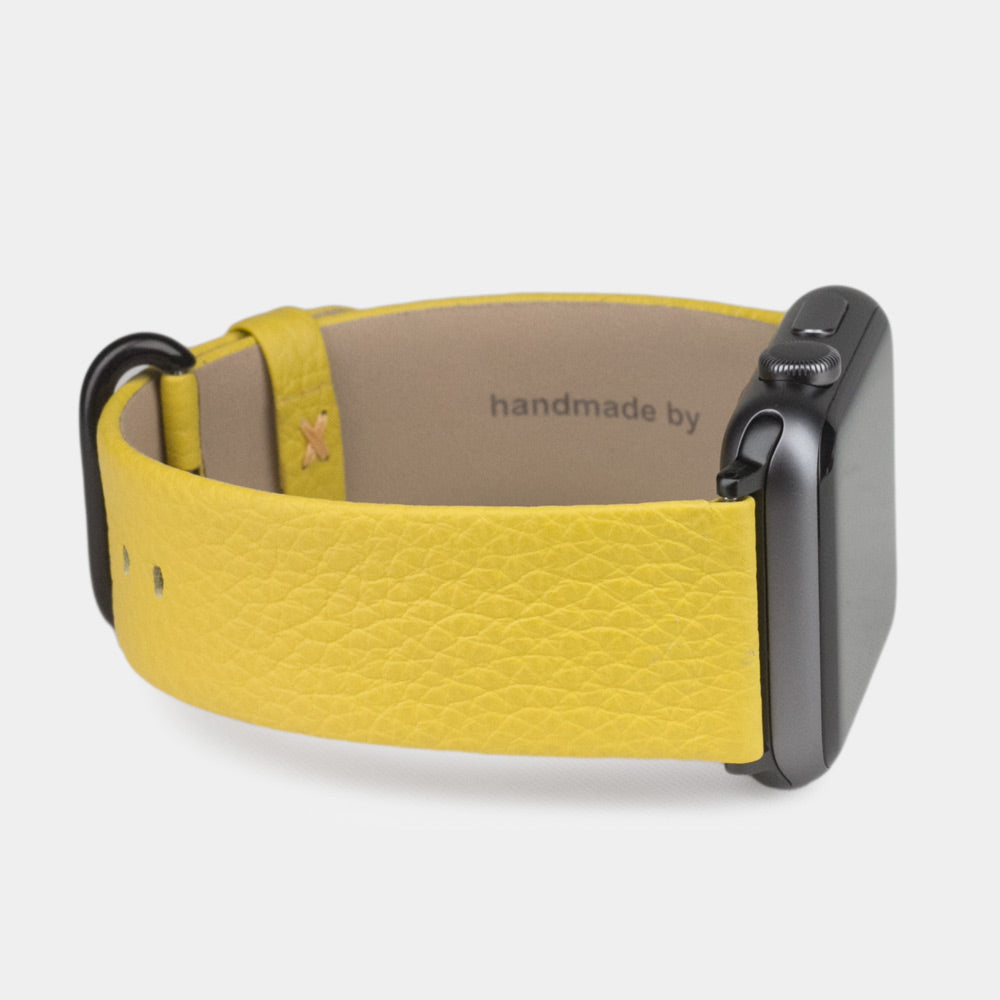 Armband für die Apple Watch 41/42 mm aus weichem genarbtem Kalbsleder in Gelb, mit schwarzen Adaptern und Schnalle | 3/4-Ansicht des Innenfutters aus Leder