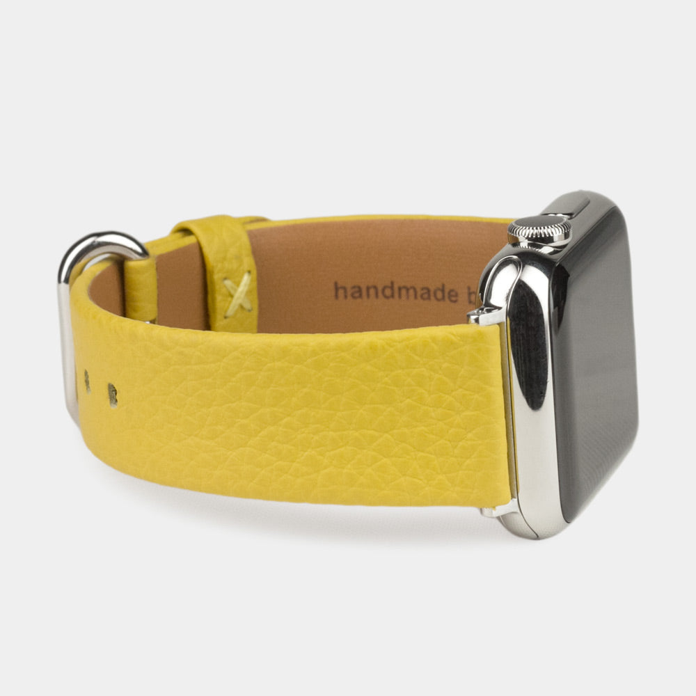 Armband für die Apple Watch 41/42 mm aus weichem genarbtem Kalbsleder in Gelb, mit Adaptern und Schnalle aus Edelstahl | Nahaufnahme des Innenfutterleders und der Markenprägung