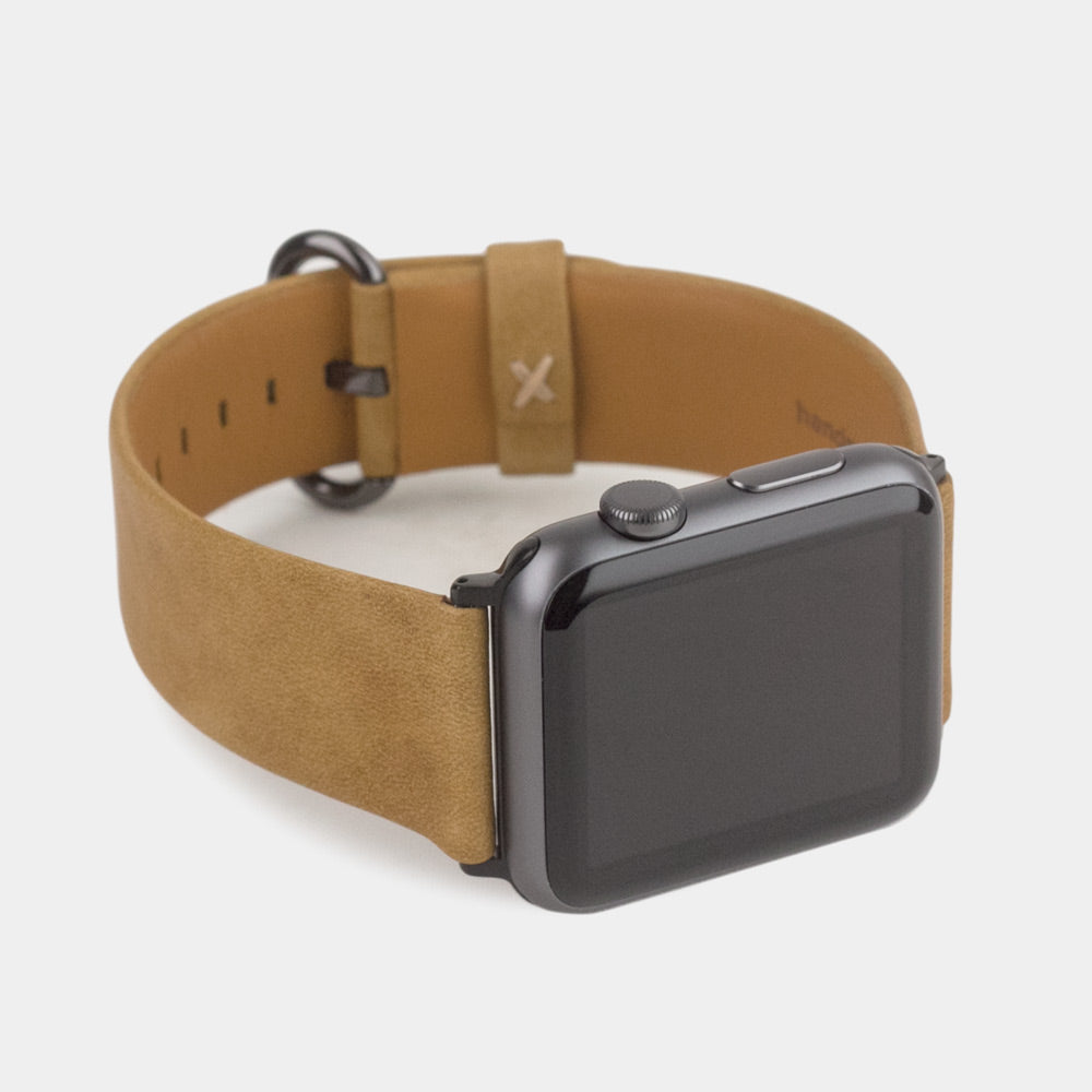 Cinturino per Apple Watch 45/46 mm in pelle di vitello liscia color vintage, con adattatori e fibbia neri | vista di 3/4 per vedere la pelle della fodera interna
