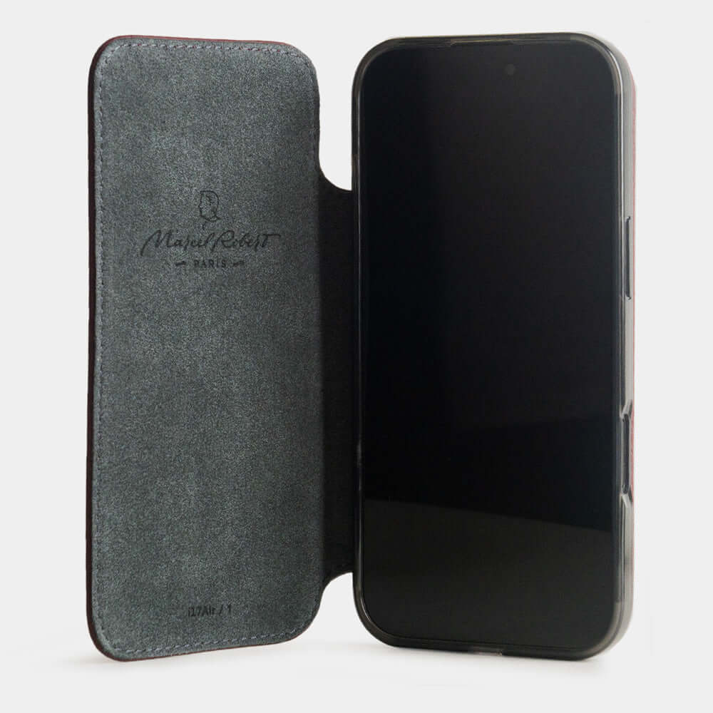 Bordeaux Calfskin Wallet Case iPhone 17 Air - case with grey Alcantara lining shown open on smartphone
