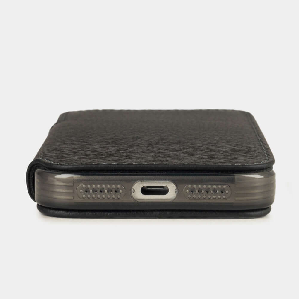 black Calfskin Wallet Case iPhone 17 Pro- flat side view displaying ultra-thin handcrafted design, USB-C port opening and precise edge finishing