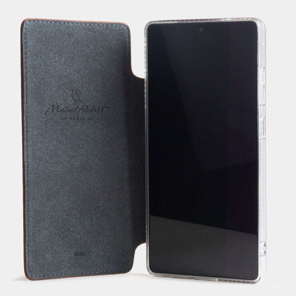 Gold calfskin wallet case for Samsung Galaxy S24 Ultra – case opened flat, revealing the Alcantara® inner protective lining