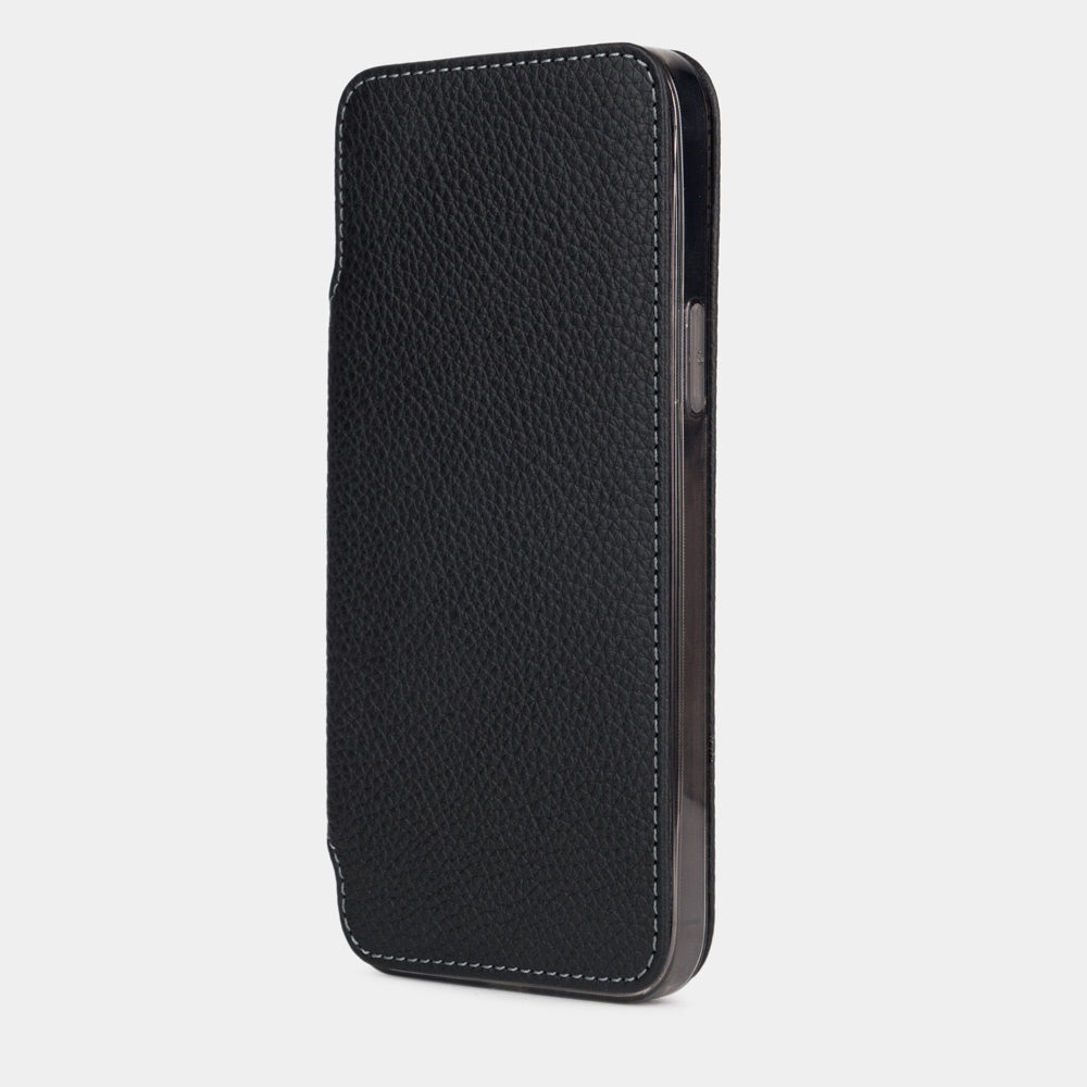 Black calfskin leather folio case for iPhone 15 Pro – folio closed, three-quarter front view showing the full-grain leather