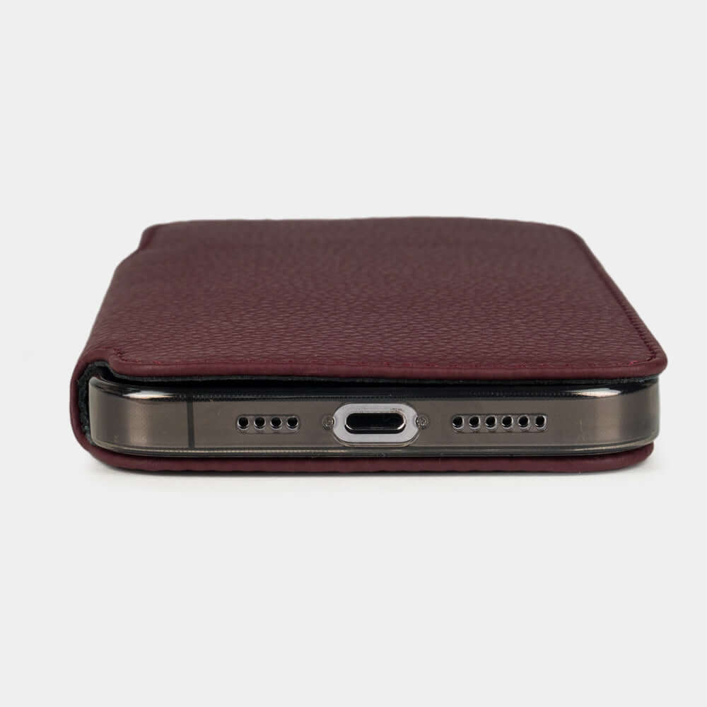 Bordeaux Calfskin Wallet Case iPhone 17 - flat side view displaying ultra-thin handcrafted design, USB-C port opening and precise edge finishing
