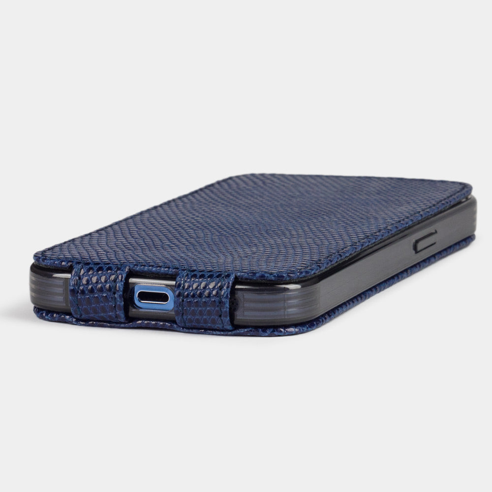 iPhone 14 Pro flip case in blue lizard leather – the case laid flat, showing the precise charging-port cut-out and slim profile
